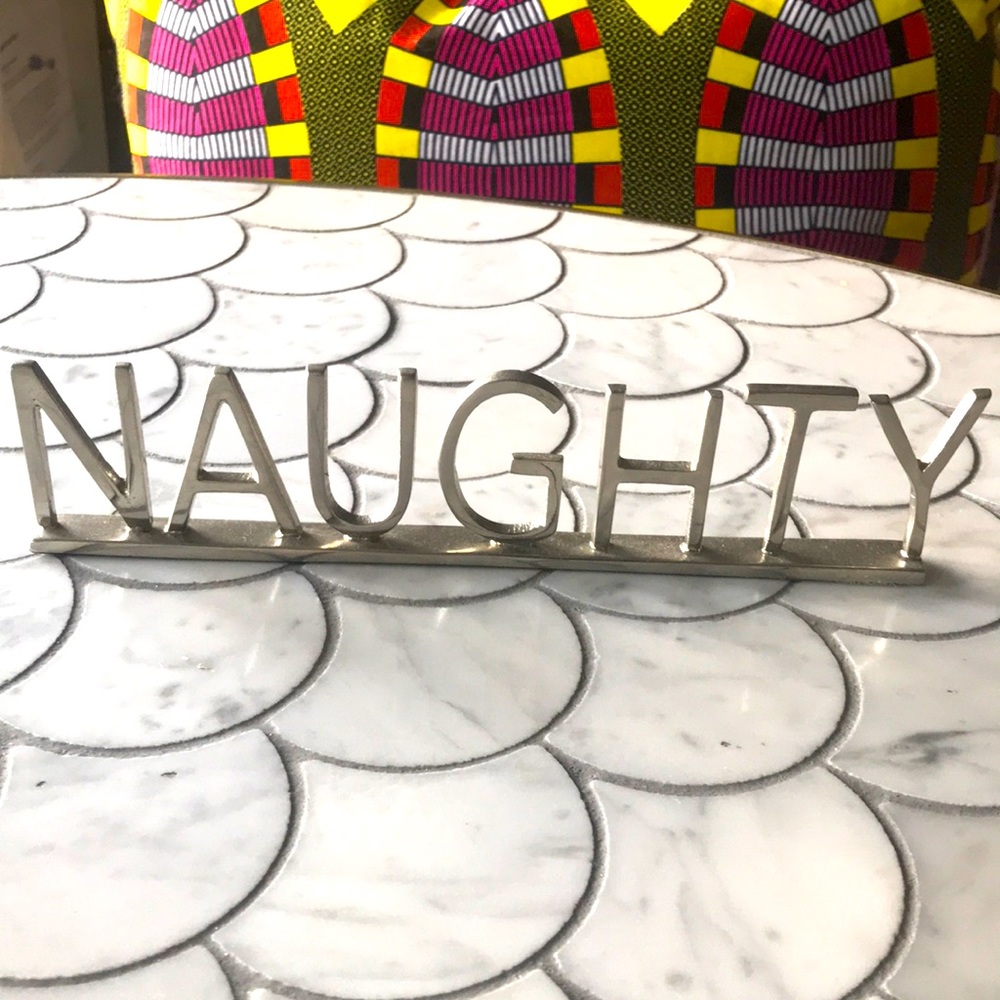 West Elm ‘naughty’ sign decoration